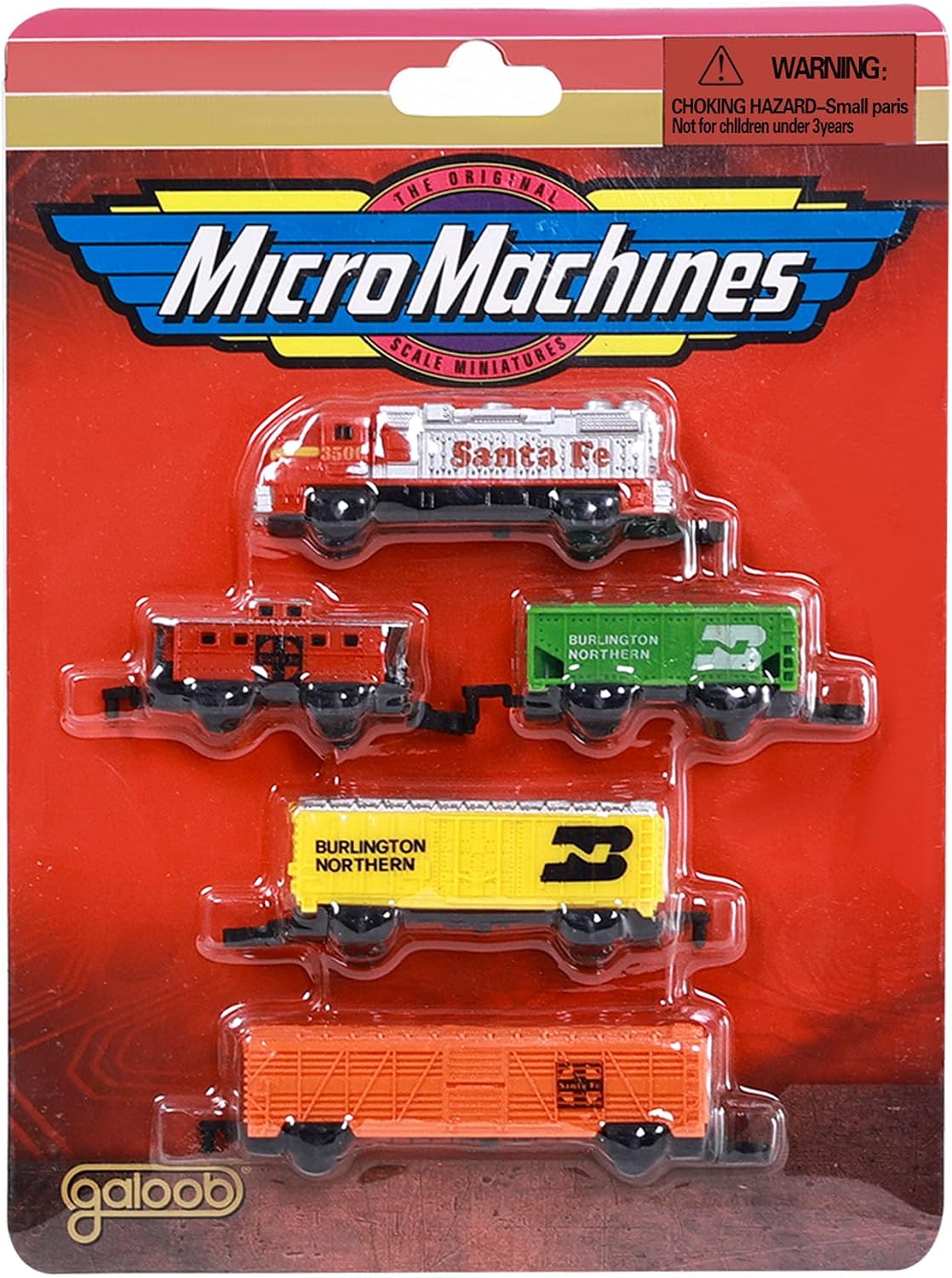 Vintage Galoob Micro Machines five piece train set sealed on its red card with a Santa Fe locomotive and Burlington Northern freight cars