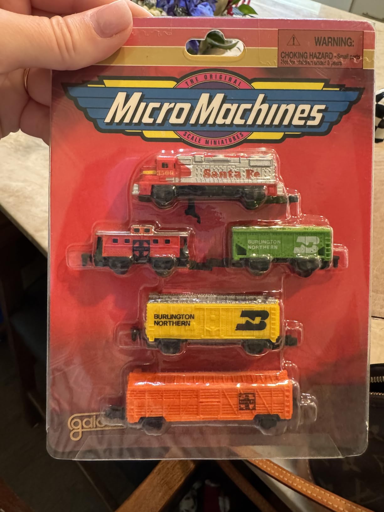 Customer photo of a sealed vintage Galoob Micro Machines train pack held in hand
